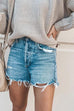 Pantaloncini Kelsidress Street Style con orlo grezzo strappati e tasche