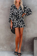 Tuta stampata a vita con maniche a pipistrello con scollo a V casual di Kelsidress