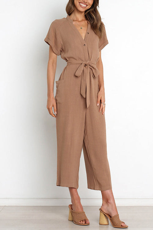 Tuta corta Kelsidress con scollo a V e maniche corte con allacciatura in vita con tasche