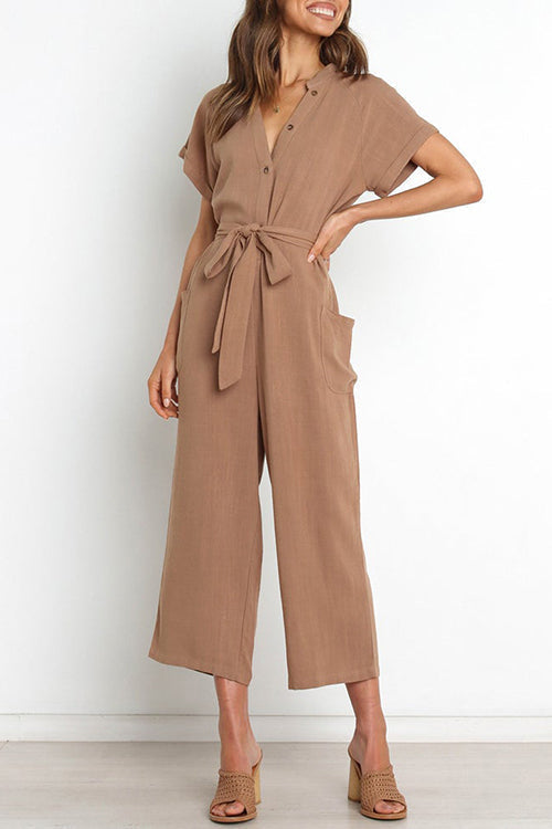 Tuta corta Kelsidress con scollo a V e maniche corte con allacciatura in vita con tasche