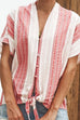 Camicia Kelsidress a maniche corte con scollo a V e nodo in vita a righe in cotone e lino