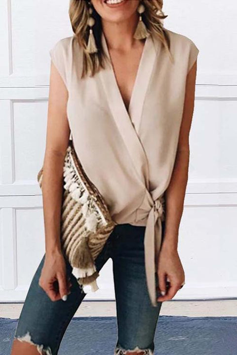 Kelsidress Solid Wrap scollo a V senza maniche annodato sul lato